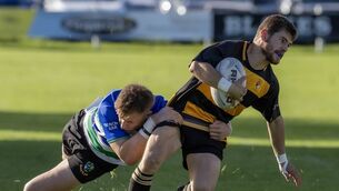 <p>Carlow's Jonathan Crosssley is tackled by Gorey's Harley Barnett. All Photo: Thomas Nolan</p>