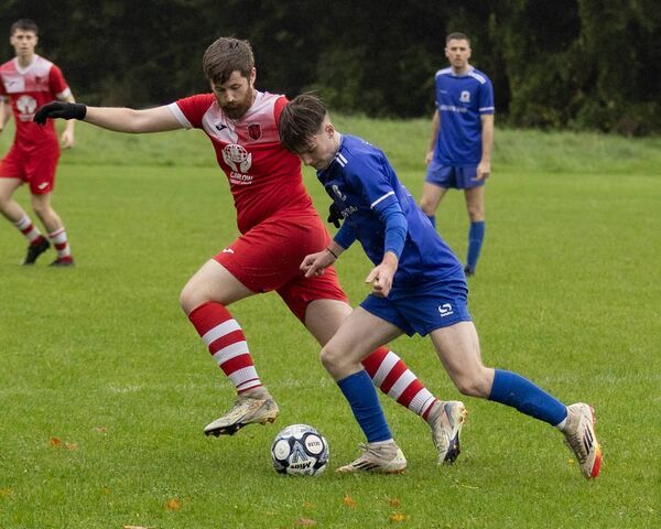 Wolfhill's James Keating finds no way past Castle Rangers' Travis Timmins. Wolfhill's James Keating finds no way past Castle Rangers' Travis Timmins.