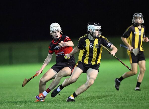Naomh Eoin's Michael O'Toole turns sharply against MLR's Jake Fitzpatrick.
Naomh Eoin's Michael O'Toole turns sharply against MLR's Jake Fitzpatrick.