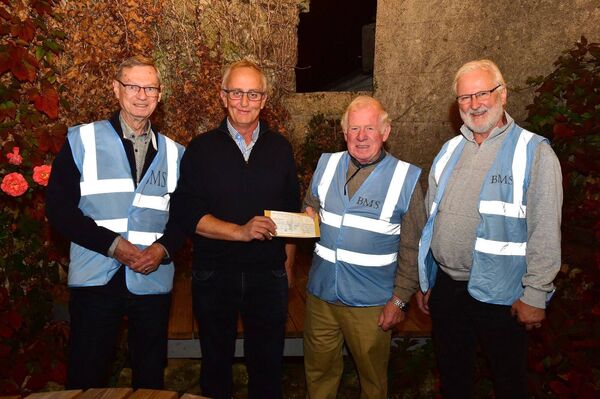 Matt Scully presents a cheque to Tony Heywood, John Meaney and Larry Allen from Borris Men's Shed Matt Scully presents a cheque to Tony Heywood, John Meaney and Larry Allen from Borris Men's Shed