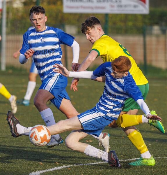St Fiacc's' Michael Whelan and Thomas Lawler keep the ball away from Crettyard’s Cian O’Sullivan.  St Fiacc's' Michael Whelan and Thomas Lawler keep the ball away from Crettyard’s Cian O’Sullivan.