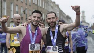 <p>Ian Molloy, right, celebrates after his brilliant run in the Dublin Marathon</p> <p>Ian Molloy, right, celebrates after his brilliant run in the Dublin Marathon</p>