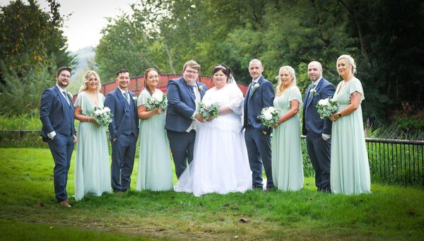 Tommy and Lisa Fogarty with their wedding party. Photo by John O’Carroll. Tommy and Lisa Fogarty with their wedding party. Photo by John O’Carroll.
