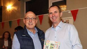 <p>Author John Kelly, right, is congratulated by Carlow GAA Communications Officer, Ger Doyle at his recent book launch in Palatine GAA Club </p> <p>Author John Kelly, right, is congratulated by Carlow GAA Communications Officer, Ger Doyle at his recent book launch in Palatine GAA Club </p>