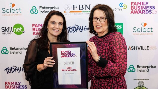 <p>Stephanie Codd and Alice O'Keefe of Codd Mushrooms with the Agri Family Business Silver award at the National Family Business Award ceremony at Johnstown Estate Photo: Paul Sherwood</p>
