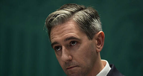 Woman in court accused of sending threatening messages to Tánaiste Simon Harris