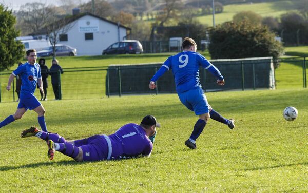Bagenalstown’s Danny Doyle rounds Crettyard’s goalkeeper Matt Kelly to score the opening goal of the LFA match in McGrath Park, Bagenalstown. Pic:© Michael O'Rourke Photography 2025