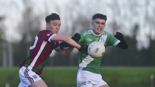 <p>Cathal Ward (Portarlington) looks to intercept this ball aimed at Killeshin's Evan Askin Photo: Denis Byrne</p> <p>Cathal Ward (Portarlington) looks to intercept this ball aimed at Killeshin's Evan Askin Photo: Denis Byrne</p>