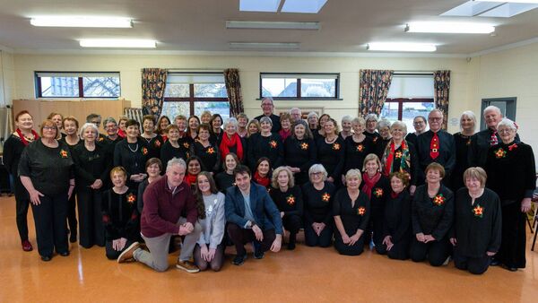 Singers Maksym Lozovyi and Holly Harmon and musical director Ollie Hennessy with Carlow Community Choir, led by conductor Mary Amond O'Brien 