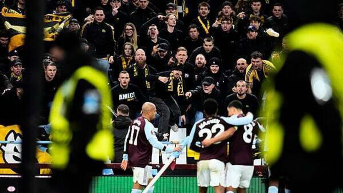 Donyell Malan scores twice but Aston Villa win is marred by trouble in away end