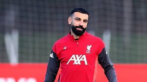 Mohamed Salah appears in good spirits during Liverpool training session