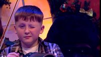 Cheeky County Carlow musician winks perfectly during Toy Show performance 