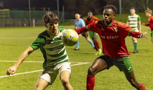 Killeshin’s Adam Farrell tries to beat St. Patrick’s Raveli Kilonda. Killeshin’s Adam Farrell tries to beat St. Patrick’s Raveli Kilonda.