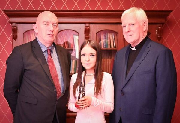 Ava Bolger was presented with the Nana Nagle Award by principal Ray Murray and Fr Con Maoldomhnaigh, chairperson of the school's board of management 