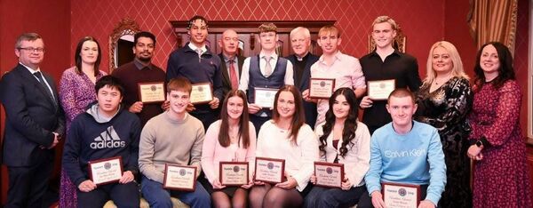 Presentation College senior academic awards: Back row: deputy principals Gary Carley and Sinéad McCarthy, students Leo Bramrock and Marc Mulhall, principal Ray Murray, Dylan Byrne, chairperson of BOM Fr Conn Ó Maoldhomhnaigh, Dylan McGrath, Charlie Feeney, Vanessa Keating, year head and Karen Donnelly, dean of year. Front row: Jia Hao Zhou, Joseph Carbery, Marie Cranny, Aoife Moody, Áine Fallon and Seán Breen