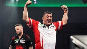 Defending champion Luke Littler cruises past David Davies as Gerwyn Price exits