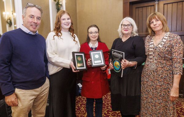 Jill Kennedy-McGrath and Kayla White, winners of the third-level history prize, with Turtle Bunbury, historian, lecturer Ida Milne and president of the society, Helen Doyle