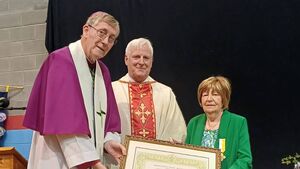 Former Gaelcholáiste principal honoured with papal medal