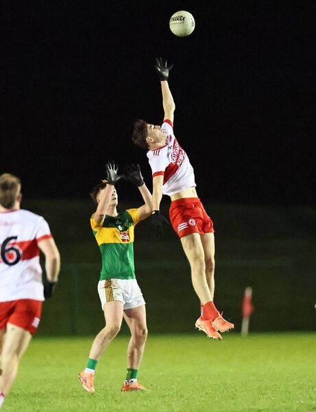 Evan Corr from Ballon rises high to trap the ball one handed during the group stage win over Rathvilly Photo: Pat Ahern