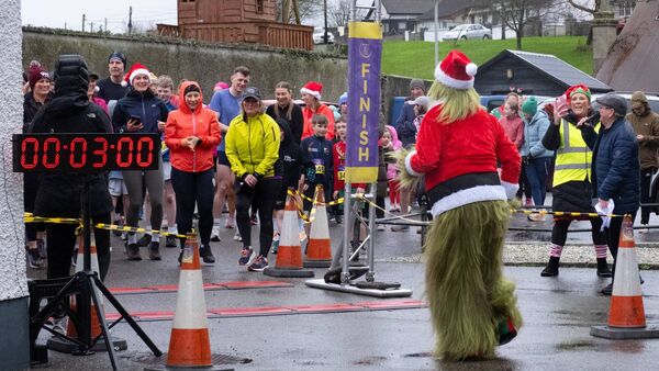 The Grinch warming up the runners right before start at the fun run in Hacketstown Photos: Annabelle Hamil