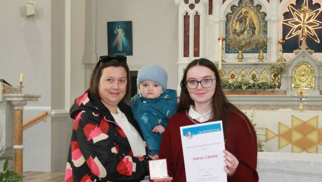 <p>Sarah with her proud mother, Clare and her cousin, Charlie Meaney </p>