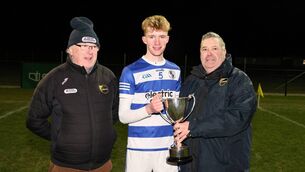 <p>Tinryland captain Lorcan O'Connor receives the Stryve Under 21 FC 'B' final trophy from Carlow GAA Chairman John McDonald, with Michael Doran from Tinryland</p> <p>Tinryland captain Lorcan O'Connor receives the Stryve Under 21 FC 'B' final trophy from Carlow GAA Chairman John McDonald, with Michael Doran from Tinryland</p>