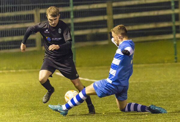 New Oak’s Sean Smithers is well tackled by St. Fiacc’s Jake Haughney. New Oak’s Sean Smithers is well tackled by St. Fiacc’s Jake Haughney.