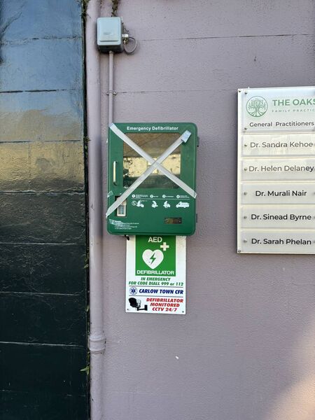 The repaired glass of the defibrillator unit outside The Oaks Family Practice on Tullow Street. 