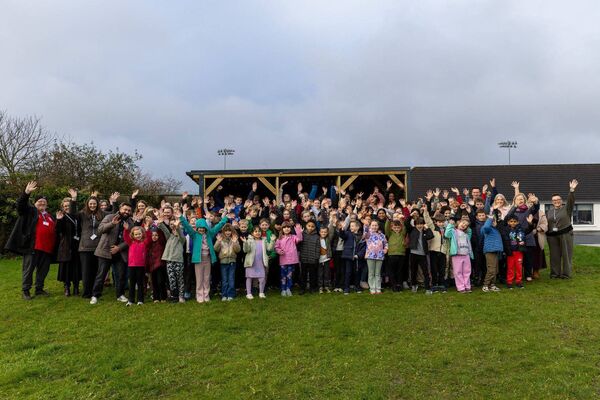 Children, teachers, SETU staff and students at the opening of the outdoor classroom