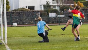 <p>Carlow’s Cliodhna Ni Shé fires past Sligo goalkeeper Ellen Maguire for the opening score of the game</p>