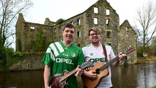 <p>Barry Doyle, left, who wrote a song about the Ireland team's hope of getting to the world cup pictured with his brother, Cillian Photo: Roger Jones </p>