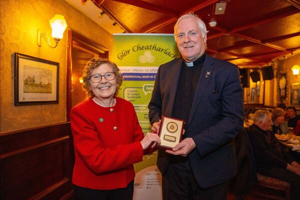 There was an award for An tAthair Conn Ó Maoldomhnaigh to mark 30 years as chaplain at the Gaelscoil and Gaelcholáiste and for ensuring all religious services are available as Gaeilge There was an award for An tAthair Conn Ó Maoldomhnaigh to mark 30 years as chaplain at the Gaelscoil and Gaelcholáiste and for ensuring all religious services are available as Gaeilge
