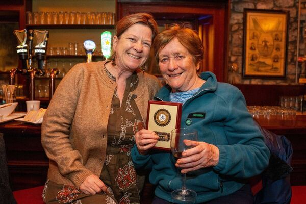 Máire Uí Hutáin was honoured for introducing thousands of young children to Irish traditional music, pictured with her daughter, Trisha Máire Uí Hutáin was honoured for introducing thousands of young children to Irish traditional music, pictured with her daughter, Trisha