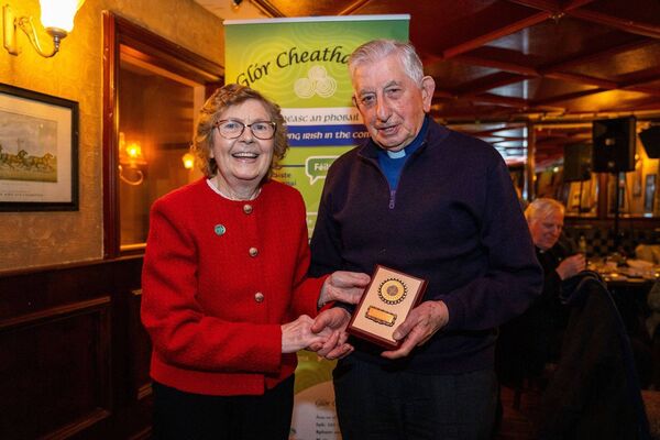 Bríde de Róiste presented a Glór Cheatharlach award to Monsignor Breandán Ó Broin to mark his continuous support for the Irish language in Carlow since 1970 Bríde de Róiste presented a Glór Cheatharlach award to Monsignor Breandán Ó Broin to mark his continuous support for the Irish language in Carlow since 1970