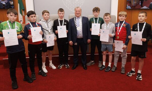 Cllr Ken Murnane with members of the Rathvilly U13 futsal gold medalists