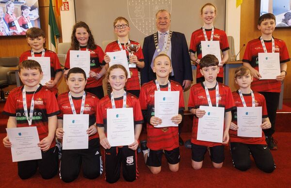 Cllr Ken Murnane with to the Slaney Valley team gold medal winners in the U11 tag rugby game