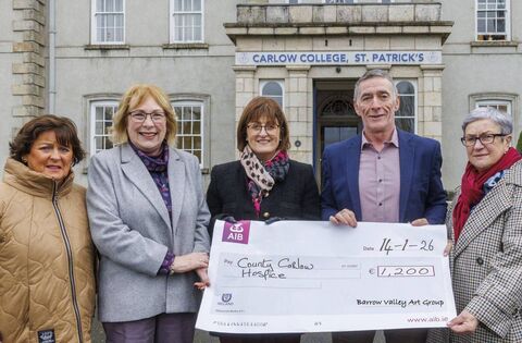 Art group presents cheque for €1,200 to county hospice