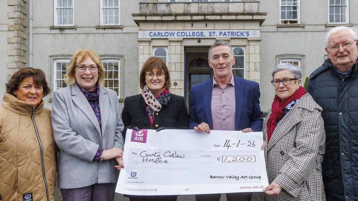 Art group presents cheque for €1,200 to county hospice