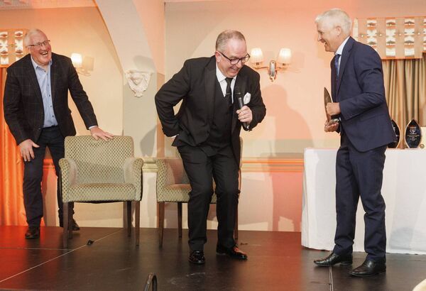 MC Brendan Hennessy, Special Guest Pat Spillane and Special Recognition winner Niall McCullagh enjoy a joke on stage Pic:© Michael O'Rourke Photography 2026