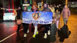 Two people arrested after sudden death in Belfast