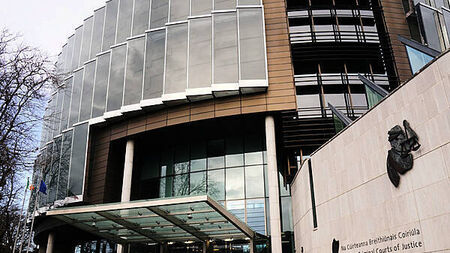 Two men high on laughing gas when they carried out assault on woman, court hears