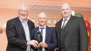 <p>Pat Spillane and Ger McNally (Sports Editor The Nationalist) presents the Special Recognition award to Niall McCullagh </p>