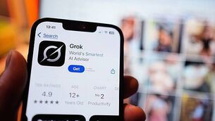 Woman arrested in probe into Belfast disorder