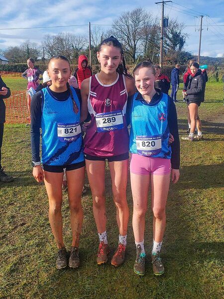Carlow athletes Erika O'Grady (St Pats), Lucy Malone (Ballon/Rathoe) and Sarah Keogh St Pats) take part in the south leinster schools Photo: St Pats AC