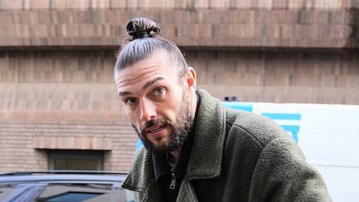Footballer Andy Carroll faces trial over alleged breach of non-molestation order