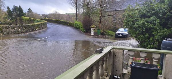 The River Derry flows along the Main Street in Clonegal. Pic: courtesy Katheriona Myler
