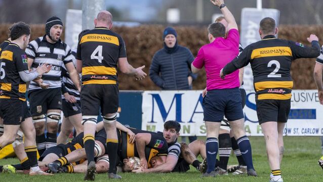<p>John Lyons gets over the line for Carlow's first try. Photos: Aisling Hyland. </p>