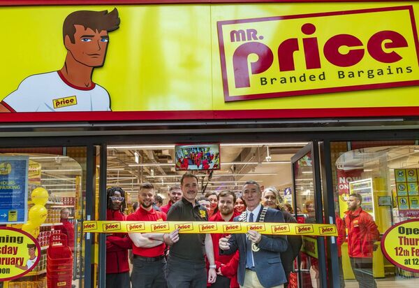 Mayor of Carlow cllr Paul Doogue cuts the ribbon to open the Mr Price discount store in the Carlow Shopping Centre