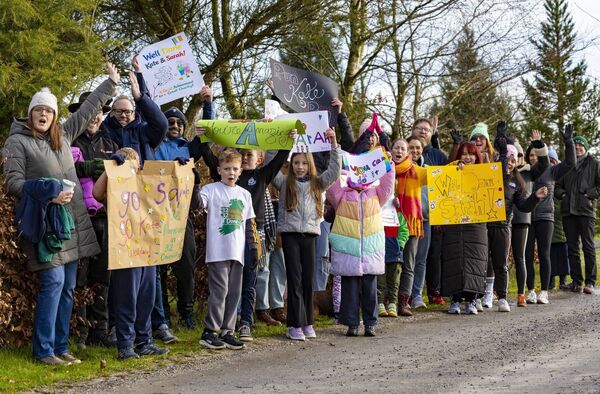 Supporters cheer on Kate Gaynor and her daughter Sarah 