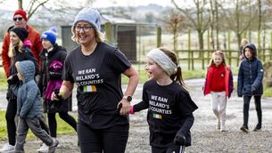<p>Kate Gaynor and her daughter Sarah on their way to completing their 32 County Park Run Challenge in aid of the Friends of the Coombe and Cerebral Palsy Football Development Academy by taking part in the Tullow Park Rin in Rathwood Photo: Michael O'Rourke Photography 2026</p>
